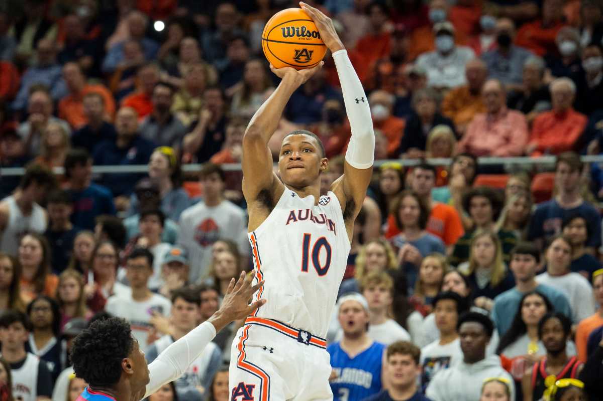 Auburn Tigers forward Jabari Smith (10) takes a jump shot as Auburn Tigers take on Mississippi Rebels at Auburn Arena in Auburn, Ala., on Wednesday, Feb. 23, 2022.